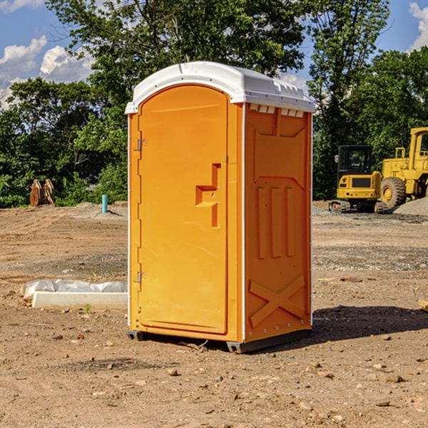 how often are the portable restrooms cleaned and serviced during a rental period in Rockingham